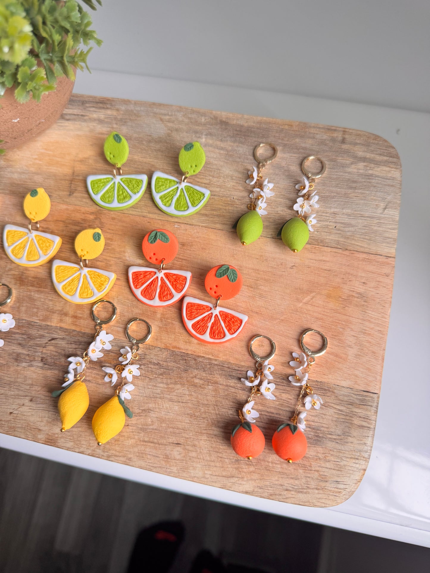 Citrus blooms and fruit slice dangles